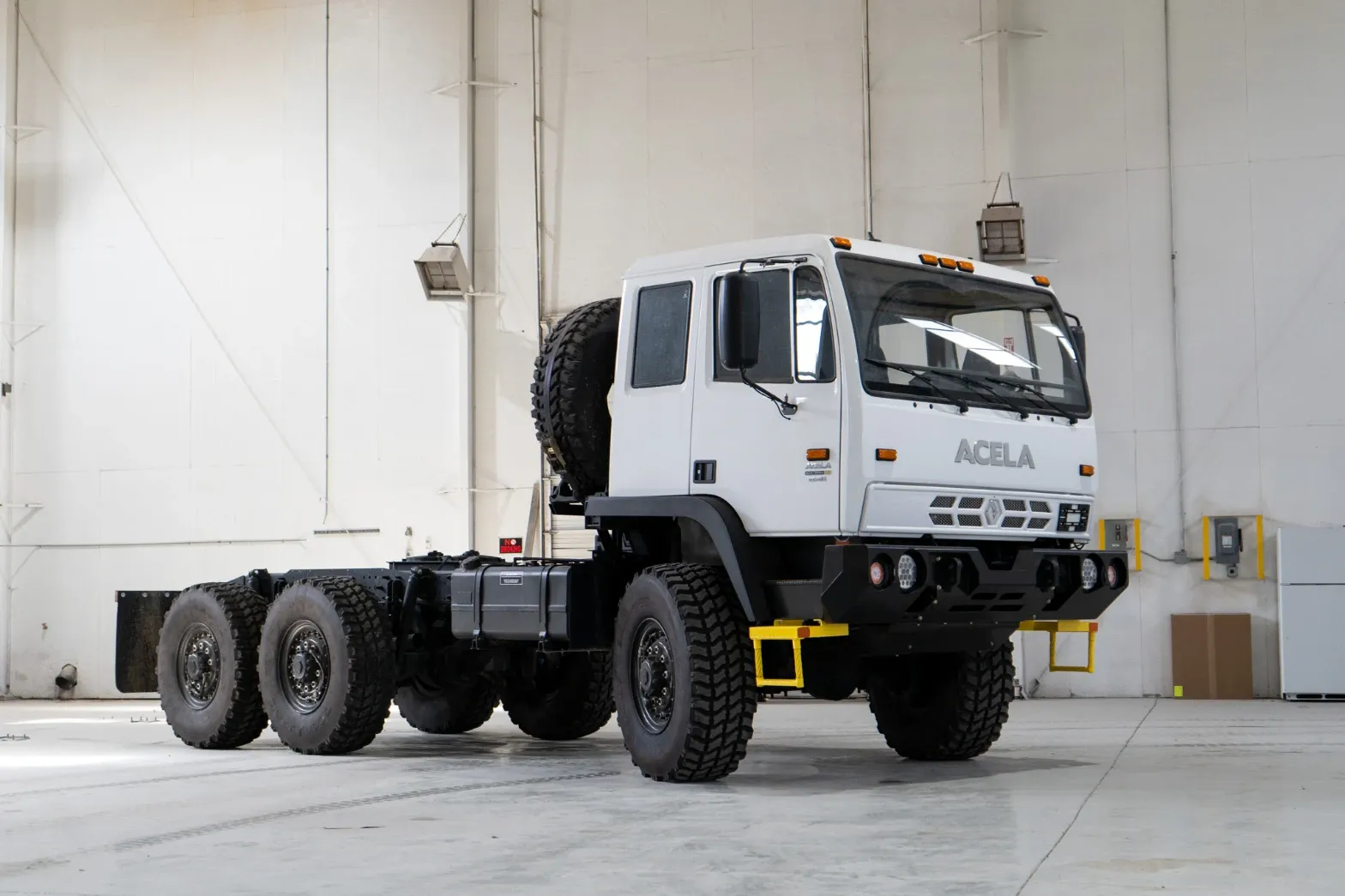 White Acela Monterra 6x6 cab-over truck chassis in the Foundation Vehicles shop