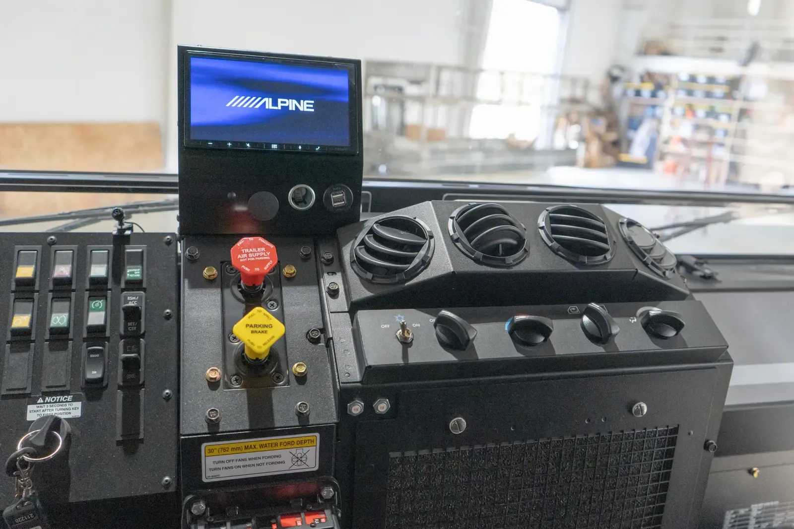 The Acela Monterra 6x6 cab dashboard and controls