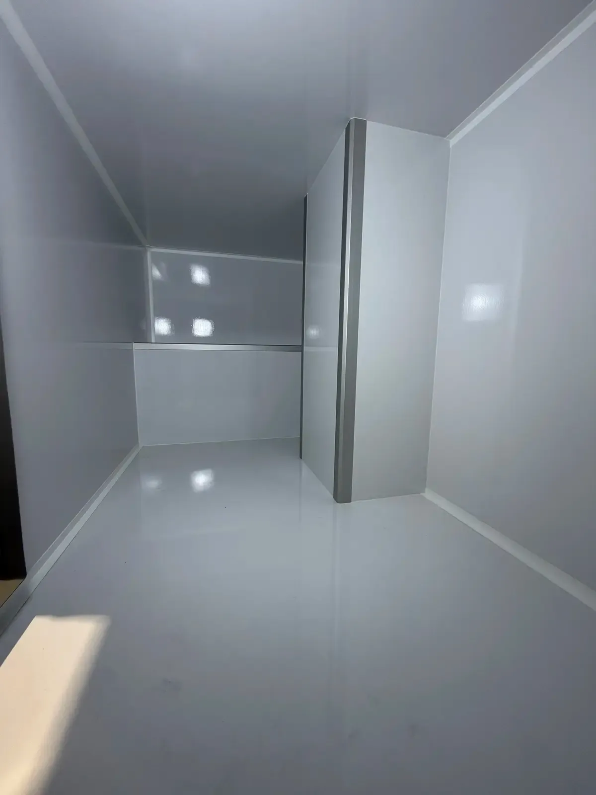 Inside the Voyager's bright composite body looking toward the rear entry