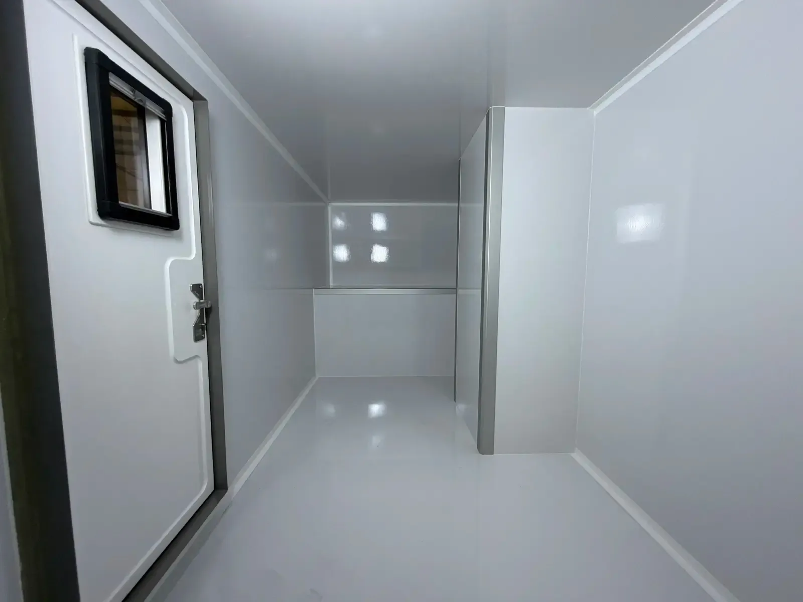 Inside the Voyager's composite body with an awning window on the wall