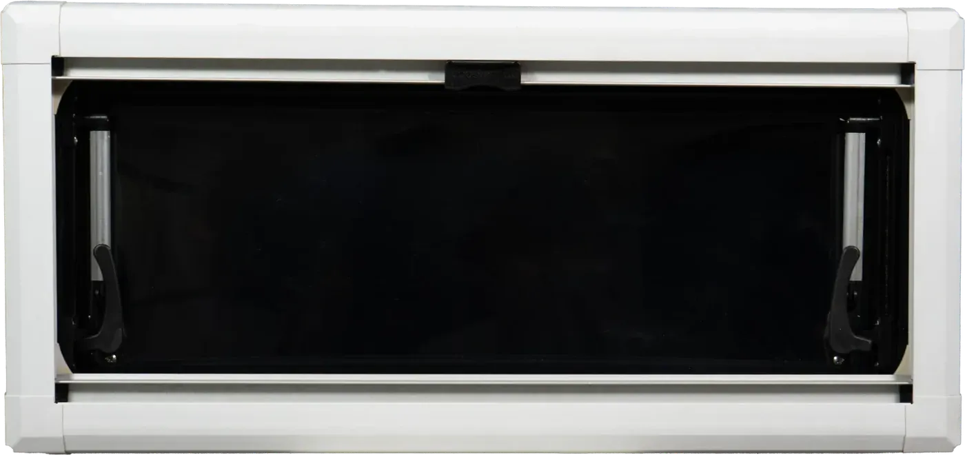 The inside of a Foundation Vehicles window with a white frame, showing the twist latches and opening stay arms
